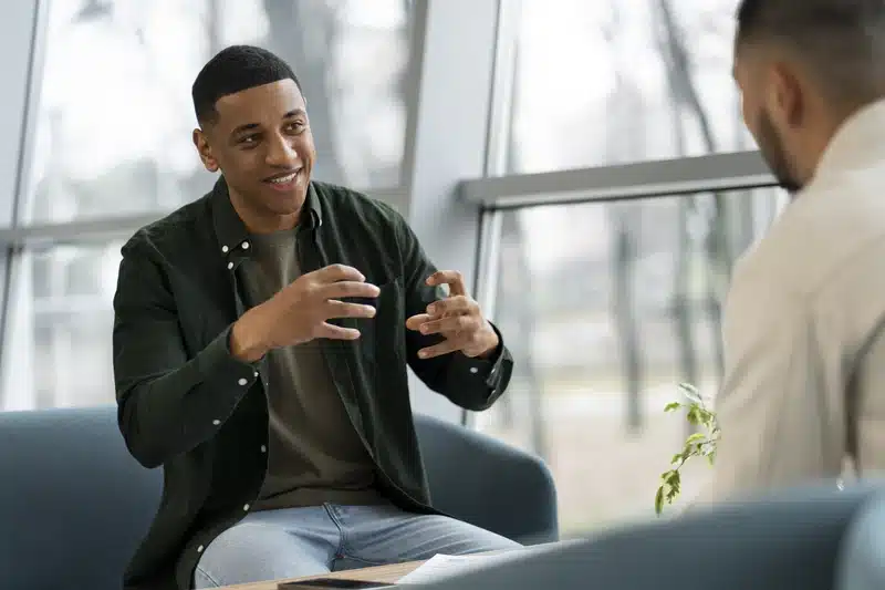 Man speaking during addiction therapy session