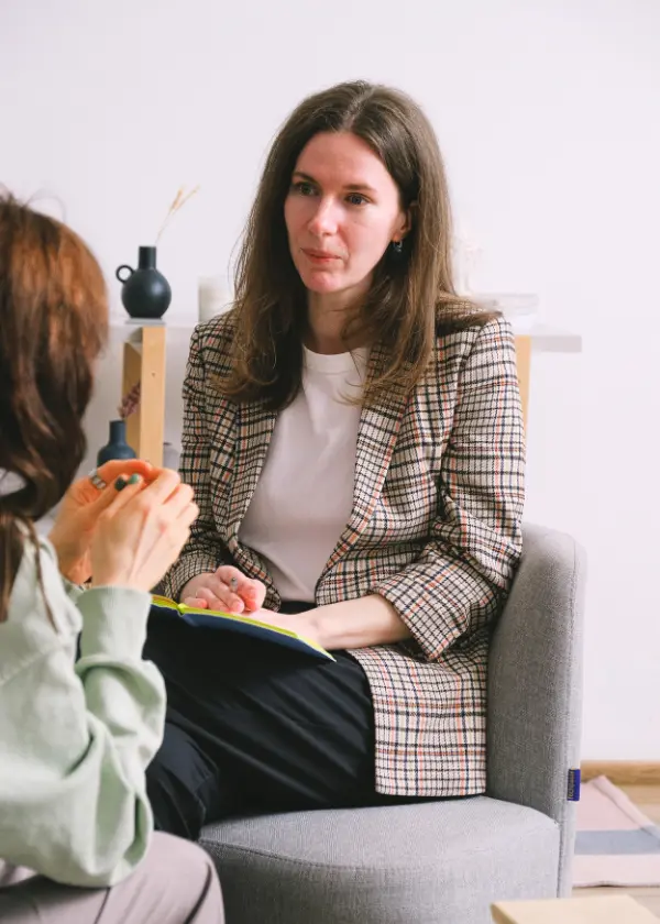 Woman receiving addiction counseling