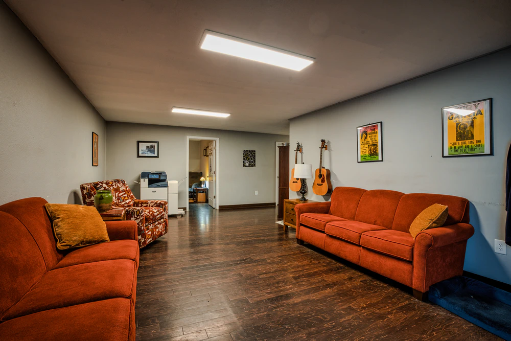 group-therapy-room-with-art-and-guitars-on-the-wall
