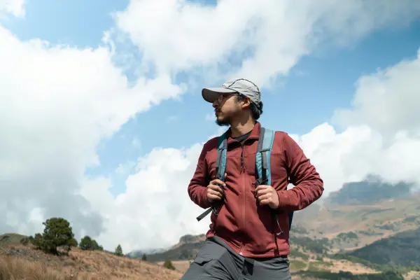 man hiking with backpack